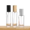 Botella de perfume de vidrio transparente de 15 ml y 18 ml, venta al por mayor, disponible en stock, envase de perfume, botella vacía, botella de muestra en aerosol portátil.