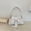 Bolsa cruzada nueva para mujer 2026, bolsa cruzada retro de nicho, bolso de mano de cuero suave de alta gama, bolso de hombro versátil