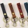 Cordão Chaveiro de Couro Transfronteiriço Chaveiro Laserável Pingente de Bolsa Chaveiro de Couro de Nicho para Homens e Mulheres