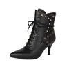 Pedido extranjero transfronterizo otoño e invierno 2026 talla grande botas de caña baja 40-43 punta fina remache cordones frontales botas estilo Martin para mujer
