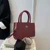 Primavera 2026 Design Casual Fashionável Simples Casual Padrão Trançado Retrô Portátil de Ombro Transversal Pequena Bolsa Quadrada para Mulheres