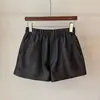 Pantalones Cortos de Cuero Minimalistas para Mujer 2026 Otoño Nuevos Casuales Versátiles Elásticos de Cintura Alta Adelgazantes de Pierna Ancha Pantalones para Mujer Pantalones de Pierna de Trompeta Línea A