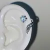Alas de garra de dragón ultra-flash circonio importado microincrustación tridimensional sin impacto pequeño pendiente para el lóbulo de la oreja pendientes para mujer venta al por mayor