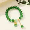[Venta al por mayor directa de fábrica] Nuevo estilo chino Imitación Jade Dongling Puesto de Exhibición de Feria de Templo del Mercado Nocturno Pulsera de Vidrio Joyería Más Vendido