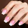 Puntas de uñas vestibles transfronterizas, color sólido rosa degradado simple, pegatinas de arte de uñas prefabricadas de longitud media, extraíbles, venta al por mayor