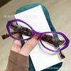 Marco de color con forma de huevo de paloma transfronterizo nuevo, espejo de lectura para ancianos, pata de resorte impresa a cinco colores, gafas de lectura HD al por mayor