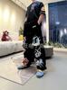 Pantalones casuales holgados de moda de verano lavados estilo americano nuevo, pantalones cargo de moda estilo japonés para mujer