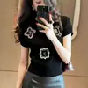 Camiseta Pulôver Bordada com Padrão Preto Estilo Francês de Manga Curta para o Verão de 2026, Top de Tricô Único e Exquisito