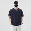 2026 Nuevo Producto Camiseta de Manga Corta para Hombre con Diseño Falso de Dos Piezas a Cuadros y Cuello Redondo, Moderna, a la Moda, Versátil, Estilo Casual Americano