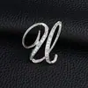 Temperamento de comercio exterior europeo y americano 26 broches de letras inglesas femenina diamante personalidad Joker moda corsage pin masculino accesorios