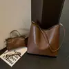 Venta al por mayor de bolsos tote nuevos de estilo coreano, sencillos y retro, con diseño para padres e hijos, gran capacidad y adecuados para uso casual, para ir al trabajo y como bolso de hombro o de axila para mujeres
