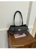 Bolso de axila retro muy elegante para mujer, nuevo bolso francés de nicho de moda para el día a día, bolso de mano de lujo ligero para salir