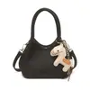 Bolso de mano para mujer transfronterizo, bolso tipo cubo de moda con patrón de lichi, diseño de nicho de alta gama, bolso cruzado versátil para mujer