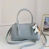 Moda Nova Primavera 2026 Versátil Bolsa Estilo Casual Grande Capacidade Ombro Transversal Bolsa Quadrada Pequena