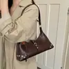 Bolsa de axila nicho estilo francês para mulheres, nova bolsa transversal de celular da moda outono 2026, bolsa transversal de ombro único de alta qualidade