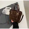 Bolso pequeño popular transfronterizo para mujer, nuevo y elegante, bolso tipo cubo esmerilado para el día a día, bolso de un solo hombro cruzado de alta calidad, moderno