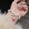 Pulsera de Fresa de Resina con Lazo de Perlas y Circonita de Lujo Pulsera Sencilla Dulce Linda Joyería Versátil de Nicho para Mujer