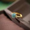 Plata de ley S925 chapada en oro incrustada jade azul natural calidad A garra de cuatro puntas simple unos pocos fideos de huevo pequeños estilo antiguo exquisito
