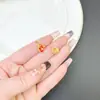 Nuevo colgante de oro arena de Vietnam marea nacional cerradura de martillo accesorios para bolsa recogedor con goteo de aceite rojo fabricantes de joyería de moda antigua