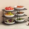 Suporte multifuncional de vários níveis para preparação e armazenamento de utensílios de cozinha, incluindo tigelas, pratos, panelas quentes, travessas e legumes.
