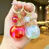 Las cosas buenas suceden cuando tienes buena suerte: Lindo y Realista Llavero de Caqui, Divertido Accesorio para Bolsa, Regalo para Mejor Amigo, Regalo de Gama Alta
