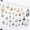 Colgante de aleación que conserva el color, mini pasador de estrella de cuatro puntas, accesorio versátil para collares, pulseras y joyería DIY, materiales para venta al por mayor