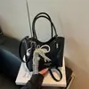 Transfronterizo 2026 Verano Nuevo Nicho de Gama Alta Bolso Tejido Bolso Cubo Simple Moda de Gama Alta Bolso de Hombro