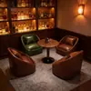 Juego de mesa y sillas de bar comercial tipo bistró de lujo ligero, mesa y sillas de bar con asientos tipo cabina para sala de fiestas, salón de música minimalista
