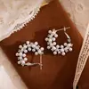 Elegantes pendientes de aro de perlas vintage con un diseño de nicho, lujo ligero y estilo sofisticado, pendientes de mujer más vendidos 2026