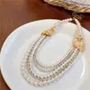 Pendientes vintage de borlas y perlas estilo francés, collar exquisito de moda de nicho de alta gama, conjunto de joyería versátil de lujo ligero para mujer