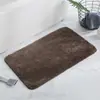 Felpudo de baño antideslizante flocado transfronterizo, alfombrilla de baño absorbente de agua, alfombrilla simple engrosada para mesita de noche de dormitorio