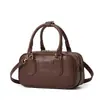 2025 Nuevo Otoño e Invierno Popular Bolso de Bowling Retro de Moda Bolso Portátil Tipo Almohada Bolso Boston de Hombro Cruzado para Mujer
