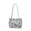 Bolso de gran capacidad, novedad de verano 2024, bolso de hombro de moda con textura de PU, bolso de mano pequeño con mariposas frescas debajo del brazo.