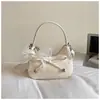Bolso de Diseño de Nicho Súper Moderno para Mujer 2026 Nuevo Bolso Cruzado Versátil Bolso de Hombro Exquisito Elegante con Patrón Tejido