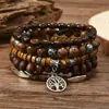 Amazon venta caliente transfronteriza pulsera de cuentas hecha a mano estilo retro para hombre pulsera de línea elástica multicapa con cuentas de madera árbol de la vida