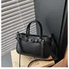 Bolso de diseño de nicho de alta gama para mujer 2026 nuevo bolso de mano de moda bolso cubo versátil bolso de hombro cruzado