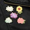 Broche de flor de comercio exterior nuevo, temperamento, lirio, girasol, gota de aceite, broche de pintura, hebilla anti-luz, venta al por mayor