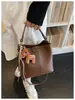 Bolsa de Mão Balde da Moda e Estilosa para Mulheres 2026 Nova Tendência Moda Bolsa de Ombro Versátil para o Dia a Dia Crossbody Pequena