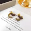 Pendientes de Trébol de Cuatro Hojas Maillard de Aguja de Plata Estilo Hong Kong Retro Elegantes Pendientes para el Trabajo Moda Femenina Lujo Ligero Pendientes de Gama Alta