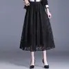 Falda Elástica con Encaje Hueco 2026 Otoño/Invierno Nueva de Cintura Alta Adelgazante de Longitud Media Elegante Falda de Línea A Acampanada