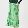Falda larga de verano estilo Miyake con un toque de alta gama, estampada, cintura elástica, corte holgado, adelgazante, elegante, versátil, falda recta