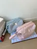 Bolsa de Maquillaje Portátil para Mujer 2026 Nuevo Modelo Portátil Nylon Impermeable Neceser Versión Tridimensional Simple Bolsa de Almacenamiento de Gran Capacidad