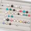 Aretes Ojo de Gato, Botones de Camisa, Remaches Estilo Chanel, Decoraciones Metálicas para Suéteres de Mujer, Broches de Perlas al por Mayor