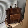 Bolso Grande Versátil Estilo Británico Retro de Moda Transfronterizo 2026 Nuevo Mochila de Negocios Bolso de Doble Hombro para Viajes al Aire Libre