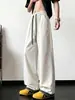 Pantalones casuales versátiles de moda para hombre, nuevo modelo 2026, diseño de cuadros patchwork, elegantes pantalones rectos holgados con cordón para hombre