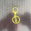 Chaveiro Ecológico com Fecho Lagosta Laqueado Chaveiro com Corrente de Quatro Seções e Pingente de Contas, Conjunto de Três Peças com Fecho Lagosta