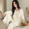 Pijama de manga larga y pantalón largo al por mayor para mujer, nuevo cárdigan de gasa de algodón con cuello redondo para otoño, conjunto casual de ropa para el hogar adecuado para usar al aire libre