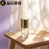 Botella redonda de base espesa de 30 ml en stock del fabricante, botella dispensadora de loción sérum tipo prensa, botella dispensadora de cosméticos