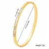 Pulsera de acero inoxidable de lujo ligero bestseller transfronteriza con incrustación de circonita en forma de diamante, accesorio de mano de moda, joyería del mismo estilo, venta al por mayor directa de fábrica