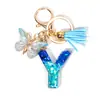 Llavero de Lentejuelas con Gradiente Azul-Verde y Letra, Borla de Mariposa Incrustada con Diamantes, Encanto para Bolso con Letra Inicial Personalizable para Bricolaje